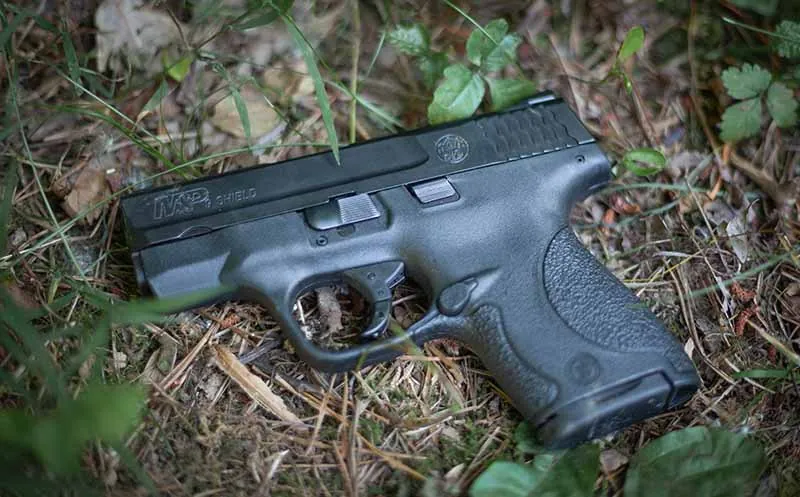 Chest holster and hip holster setups for hiking carry